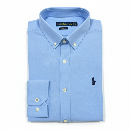 CAMISA OXFORD GRANULADO - CELESTE - LOGO COLORIDO AZUL RL